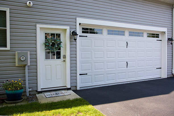 24/7 Emergency Garage Door Panel Replacement experts in Capitan, NM